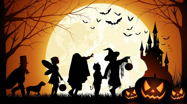 Five trick-or-treaters and their dog are silhouetted against a huge full moon with a castle and bats in the background and three jack-o-lanterns in the foreground.