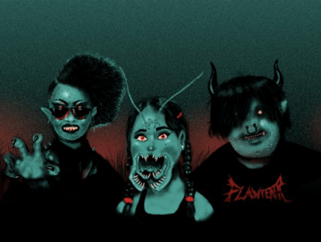 Image: from left to right, Axe, Weta, and Toro stand in front of a red, black, and bluish-green landscape. Axe wears dark sunglasses and raises a clawed hand. Weta has fanged mandibles and antennae. Toro has horns and a septum ring.